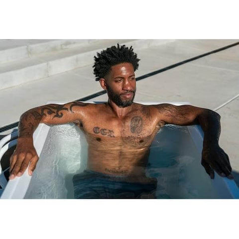 A man relaxing and enjoying the therapeutic benefits in the Luxury Spas Cold Plunge I Pro.