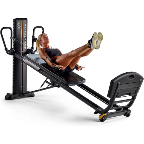 female model doing exercise on encompass pilates machine