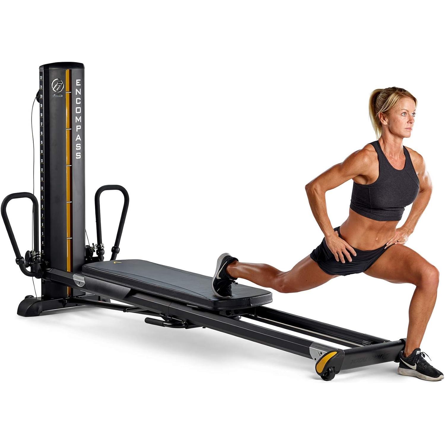 female model doing leg exercise on encompass pilates machine