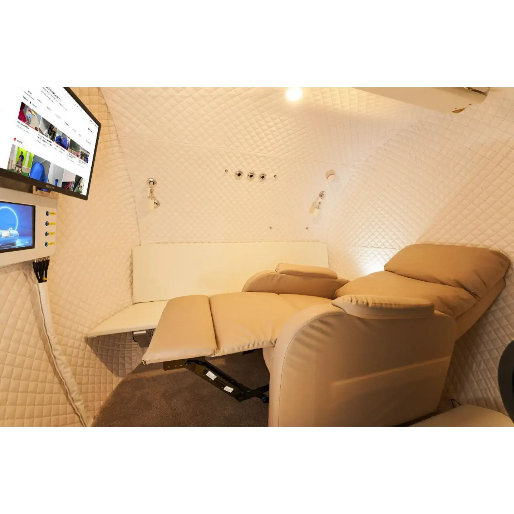 Interior view of Macy-Pan Hyperbaric Oxygen Therapy Chamber HE5000 with seating and monitoring screen.