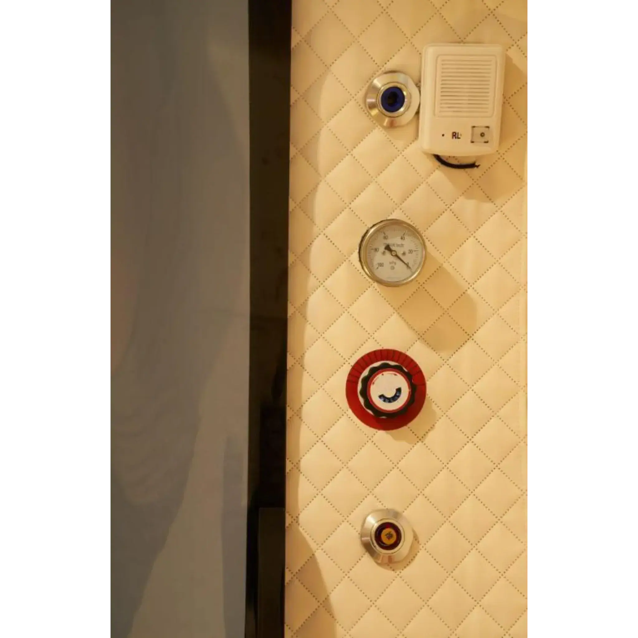 Control panel of the Macy-Pan HE5000 Hyperbaric Oxygen Therapy Chamber, featuring gauges and safety equipment.