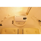 Interior view of Macy-Pan HE5000 Hyperbaric Oxygen Therapy Chamber with seating and control panel.