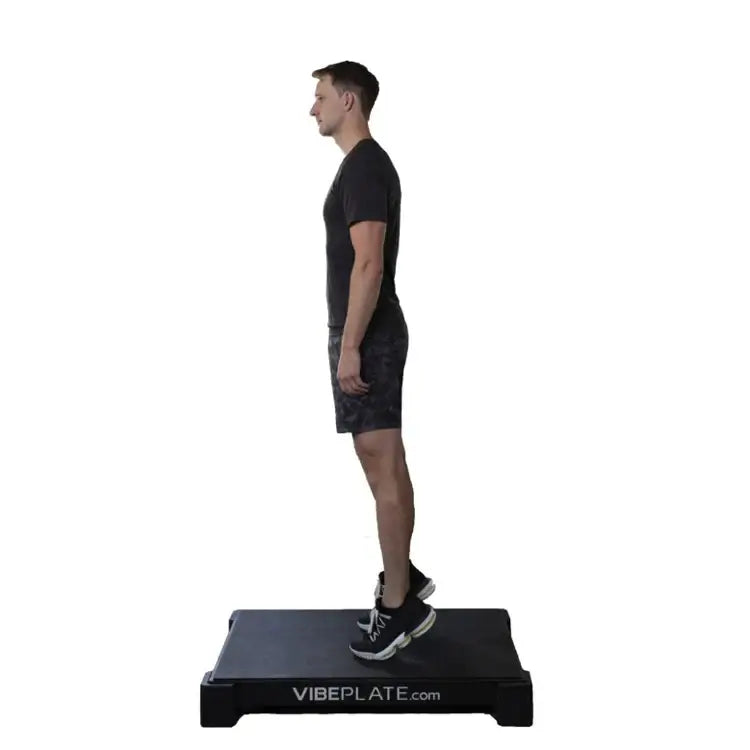 male Model doing calf raises on Vibeplate 2440 whole body vibration machines