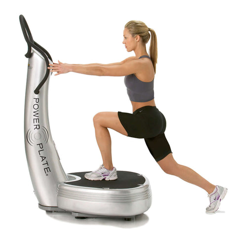 women strectching on Power Plate Pro5 fitness equipment with vibration technology