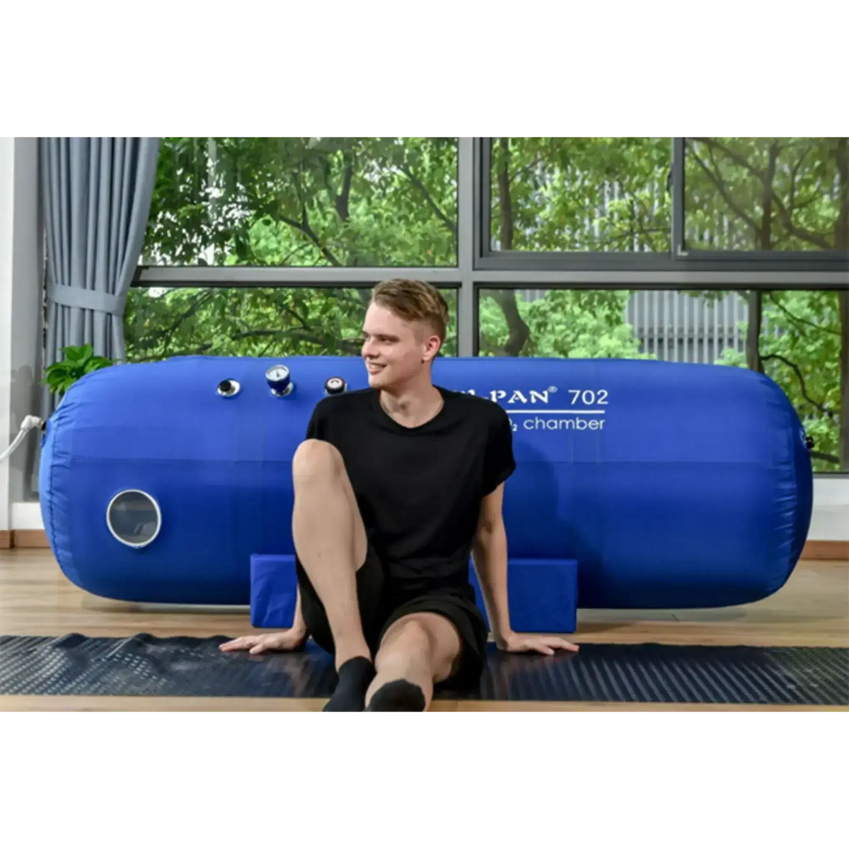 Macy-Pan ST702 Hyperbaric Oxygen Therapy Chamber with user, designed for recovery and performance optimization.
