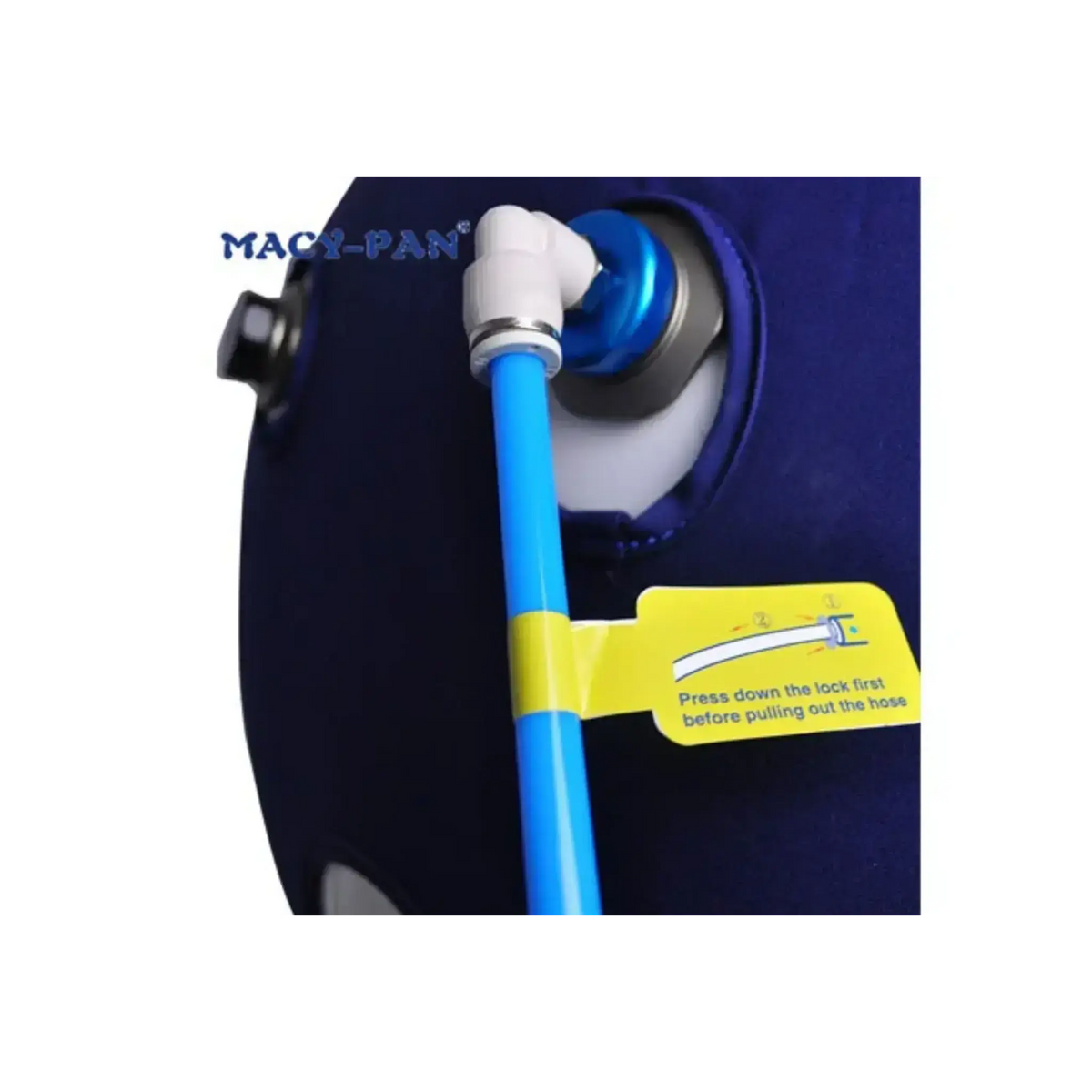 Close-up of the Macy-Pan Hyperbaric Oxygen Therapy Chamber's hose connection with safety instructions.