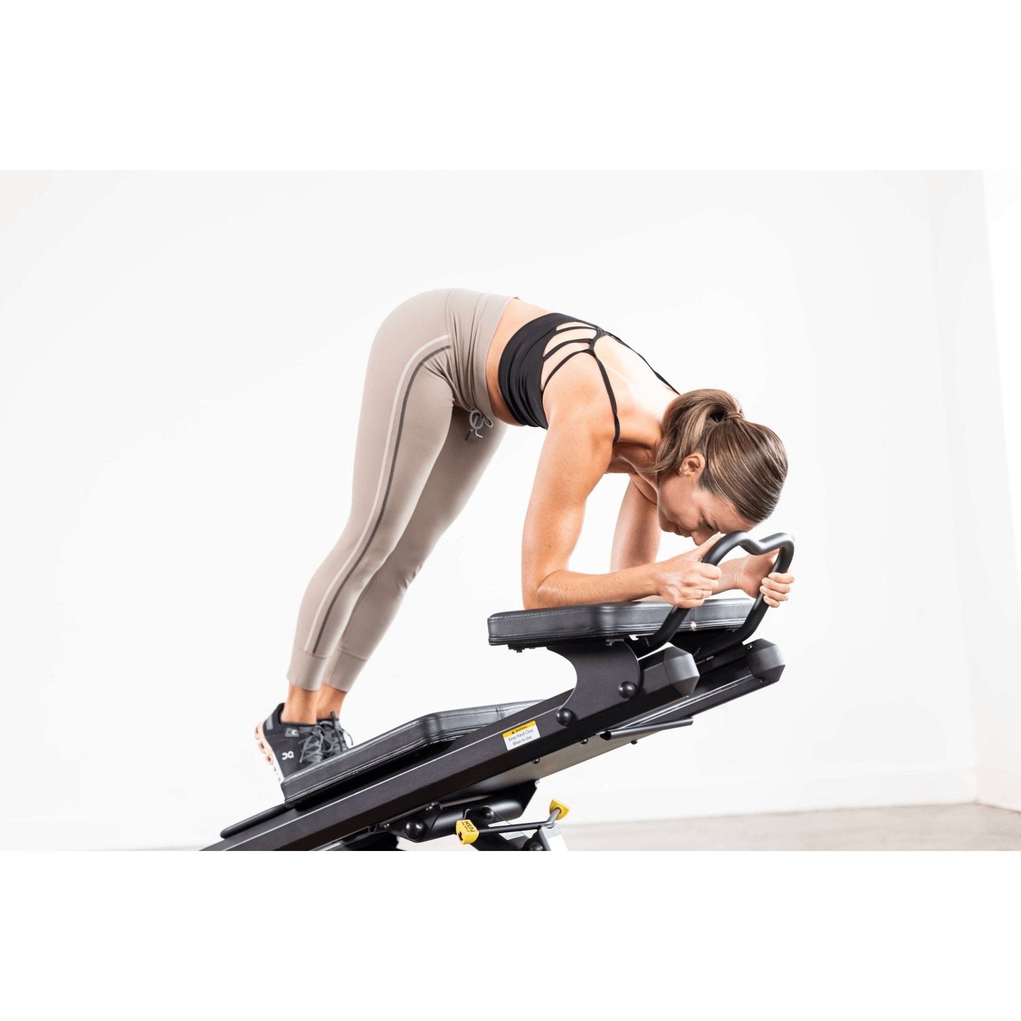 women using elevate core total gym