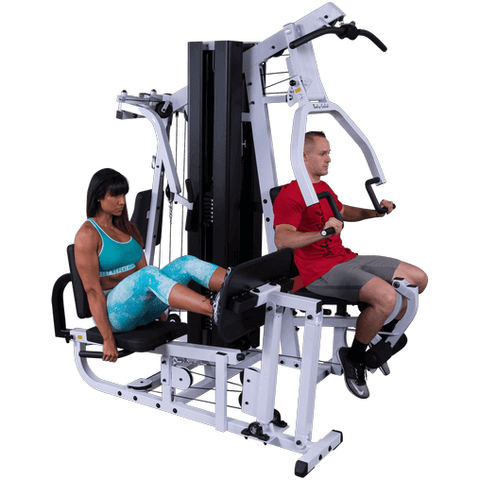 couple working out on body solid exm 3000 lps