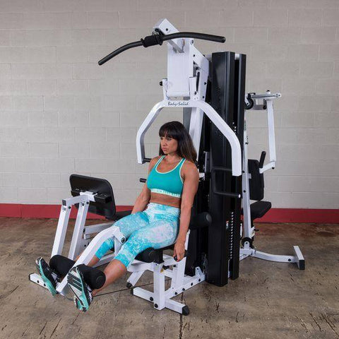 women working out on body solid exm3000lps home gym