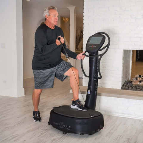 old man doing exercise on Power Plate my7 whole body vibration machine f