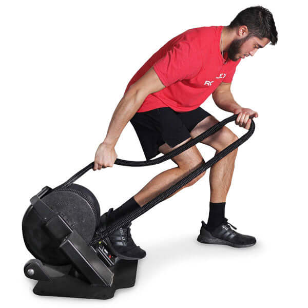 man doing leg exercises on RopeFlex RX2000 Mini Rope Trainer