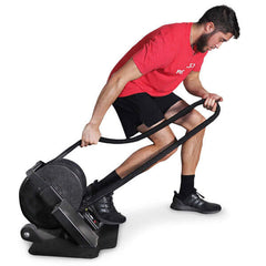 man doing leg exercises on RopeFlex RX2000 Mini Rope Trainer