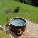 SaunaLife S4 6 Person Wood Fired Hot Tub In Garden Setting