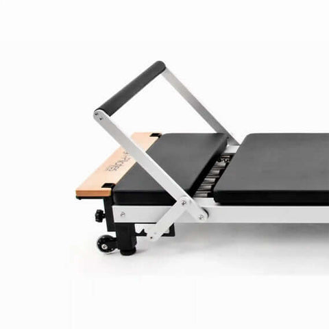 Side view of Align Pilates C8 Pro Reformer showing foot bar