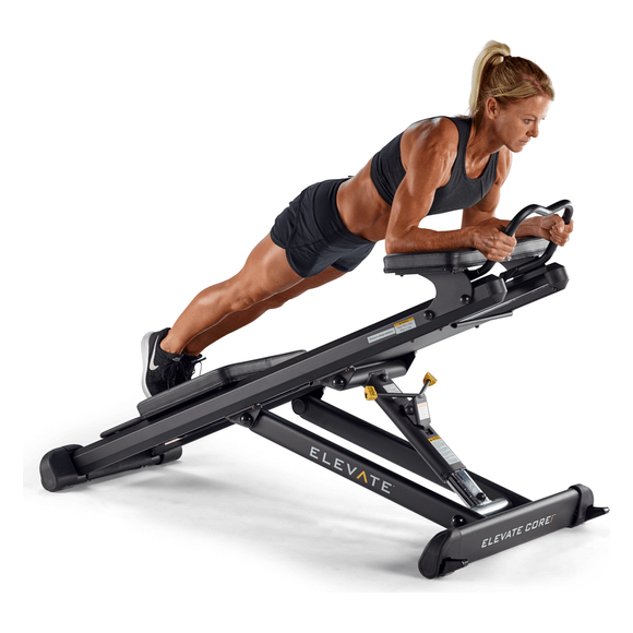 female model doing core exercises on total gym elevate row adj