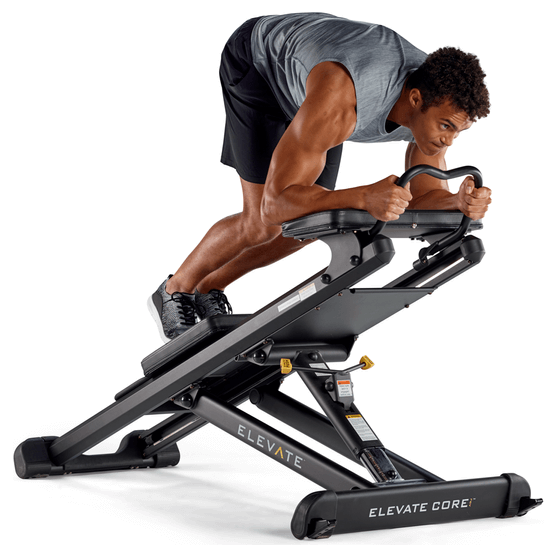 man using total gym core adj