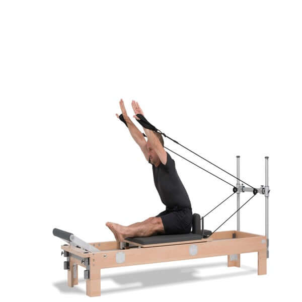 person exercising on basi reformer for sale